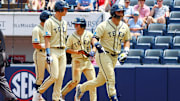 Jun 1, 2025; Oxford, MS, USA; Georgia Tech Yellowjackets first baseman Kent Schmidt (10) reacts as he returns to the dugout after a home run during the first inning against the Mississippi Rebels. Mandatory Credit: Petre Thomas-Imagn Images