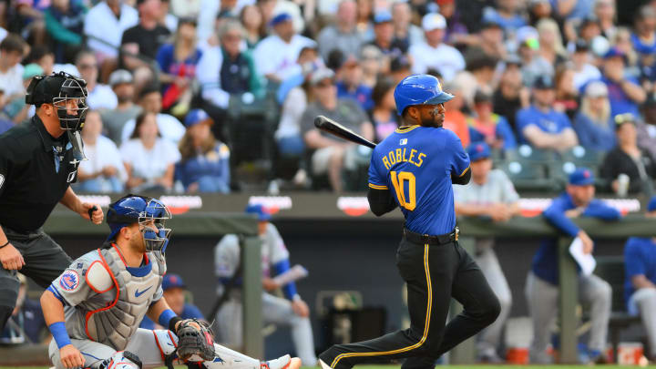 Seattle Mariners center fielder Victor Robles (10) hits a 2-RBI single against the New York Mets during the sixth inning at T-Mobile Park on Aug 11.