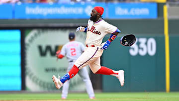 Jul 1, 2023; Philadelphia, Pennsylvania, USA; Philadelphia Phillies outfielder Josh Harrison (2) advances to second after hitting a double against the Washington Nationals in the fourth inning at Citizens Bank Park. 