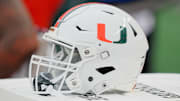 Sep 23, 2023; Philadelphia, Pennsylvania, USA;  Miami Hurricanes helmet sits on a cooler in the second half against the Temple Owls at Lincoln Financial Field. Mandatory Credit: Andy Lewis-Imagn Images