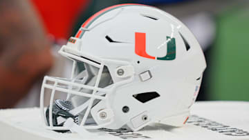 Sep 23, 2023; Philadelphia, Pennsylvania, USA;  Miami Hurricanes helmet sits on a cooler in the second half against the Temple Owls at Lincoln Financial Field. Mandatory Credit: Andy Lewis-Imagn Images