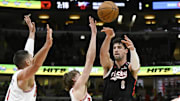 Apr 4, 2025; Chicago, Illinois, USA;  Portland Trail Blazers forward Deni Avdija (8) passes the ball against Chicago Bulls forward Matas Buzelis (14) and center Nikola Vucevic (9) during the first half at United Center. Mandatory Credit: Matt Marton-Imagn Images