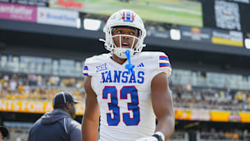 Sep 6, 2025; Columbia, Missouri, USA; Kansas Jayhawks defensive end Leroy Harris III (33) reacts during the first half against the Missouri Tigers at Faurot Field at Memorial Stadium. Mandatory Credit: Jay Biggerstaff-Imagn Images