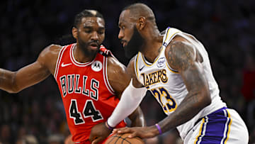 Mar 22, 2025; Los Angeles, California, USA; Los Angeles Lakers forward LeBron James (23) drives the ball against Chicago Bulls forward Patrick Williams (44) during the second half at Crypto.com Arena. Mandatory Credit: Jonathan Hui-Imagn Images