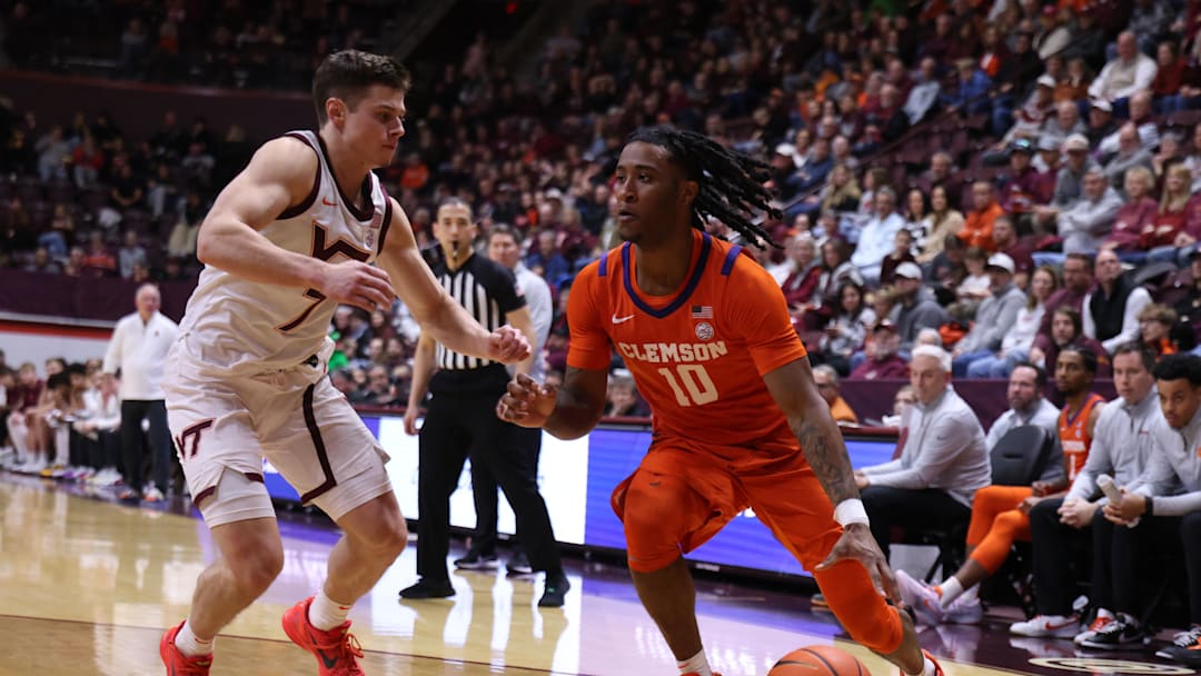 Jan 25, 2025; Blacksburg, Virginia, USA; Clemson Tigers guard Del Jones (10) drives to the basket against Virginia Tech Hokies guard Brandon Rechsteiner (7) during the second half at Cassell Coliseum. 