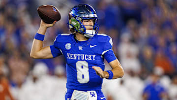 Oct 18, 2025; Lexington, Kentucky, USA; Kentucky Wildcats quarterback Cutter Boley (8) throws a pass during the first quarter against the Texas Longhorns at Kroger Field. Mandatory Credit: Jordan Prather-Imagn Images