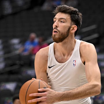 Oct 27, 2025; Dallas, Texas, USA; Oklahoma City Thunder center Chet Holmgren (7) warms up before the game against the Dallas Mavericks at the American Airlines Center. Mandatory Credit: Jerome Miron-Imagn Images