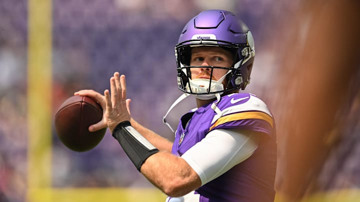 Aug 10, 2024; Minneapolis, Minnesota, USA; Minnesota Vikings quarterback Sam Darnold (14) warms up before the game against the Las Vegas Raiders at U.S. Bank Stadium. Mandatory Credit: Jeffrey Becker-Imagn Images