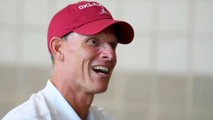 OU coach Brent Venables talks with a fan during Meet the Sooners Day for the University of Oklahoma football team at Gaylord Family-Oklahoma Memorial stadium in Norman, Okla. Saturday, Aug. 3, 2024.