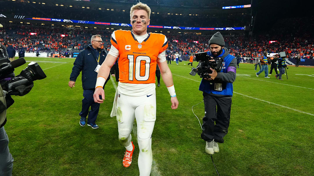 Jan 17, 2026; Denver, CO, USA; Denver Broncos quarterback Bo Nix (10) reacts after winning an AFC Divisional Round playoff game against the Buffalo Bills at Empower Field at Mile High. Mandatory Credit: Ron Chenoy-Imagn Images
