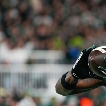 Oct 25, 2025; East Lansing, Michigan, USA; Michigan State Spartans wide receiver Nick Marsh (6)warms up prior to a game against the Michigan Wolverines at Spartan Stadium. Mandatory Credit: Brendan Mullin-Imagn Images