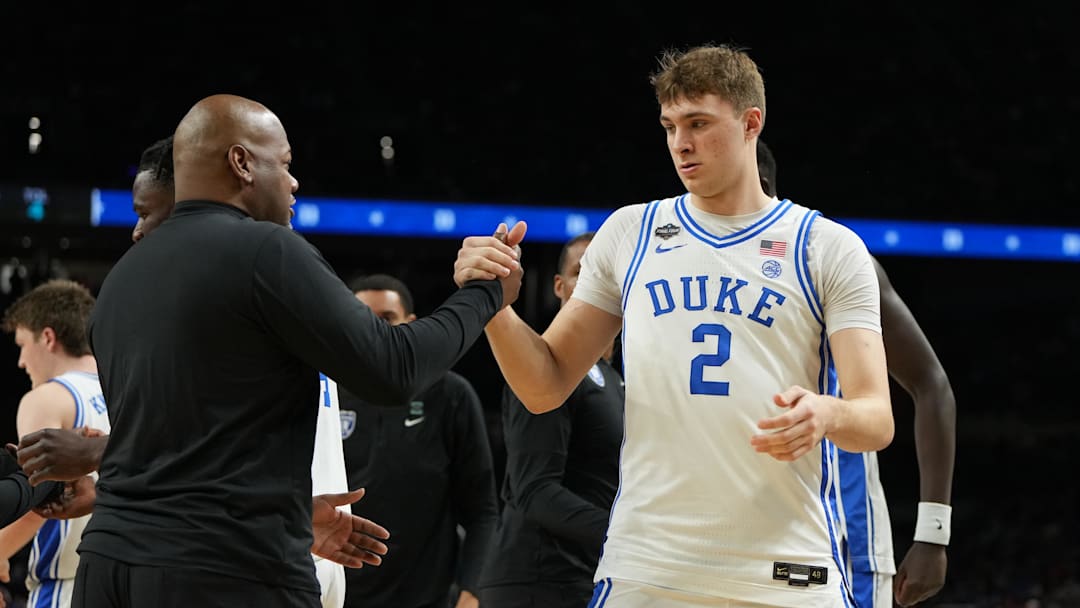 Apr 5, 2025; San Antonio, TX, USA; Duke basketball assistant head coach Will Avery with guard Cooper Flagg (2) before a semifinal of the men's Final Four of the 2025 NCAA Tournament at the Alamodome.