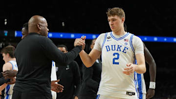 Apr 5, 2025; San Antonio, TX, USA; Duke basketball assistant head coach Will Avery with guard Cooper Flagg (2) before a semifinal of the men's Final Four of the 2025 NCAA Tournament at the Alamodome.