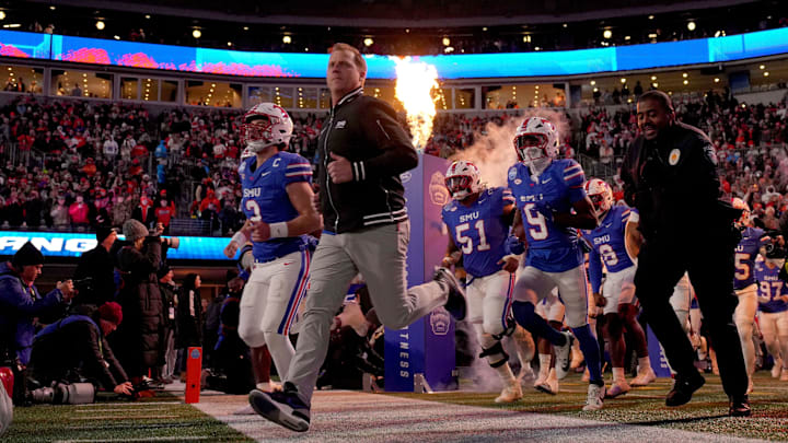 Rhett Lashlee leads SMU onto the field for the 2024 ACC Championship game against the Clemson Tigers.