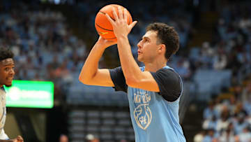 Oct 4, 2025; Charlotte, NC, USA; North Carolina Tar Heels guard Luka Bogavac (44) shoots in the second half at Dean E. Smith Center. Mandatory Credit: Bob Donnan-Imagn Images