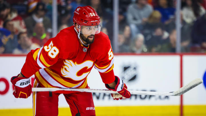 Mar 24, 2024; Calgary, Alberta, CAN; Calgary Flames defenseman Oliver Kylington (58) against the Buffalo Sabres during the third period at Scotiabank Saddledome. Mandatory Credit: Sergei Belski-USA TODAY Sports