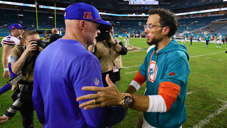 Miami Dolphins head coach Mike McDaniel shakes hands with Buffalo Bills head coach Sean McDermott after the game at Hard Rock Stadium in September 2024. | Sam Navarro-Imagn Images