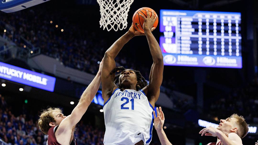 Dec 23, 2025; Lexington, Kentucky, USA; Kentucky Wildcats forward Jayden Quaintance (21) goes to the basket against Bellarmine Knights forward Michael Wilson Jr. (24) during the second half at Rupp Arena at Central Bank Center. Mandatory Credit: Jordan Prather-Imagn Images Dec 23, 2025; Lexington, Kentucky, USA; Kentucky Wildcats forward Jayden Quaintance (21) goes to the basket against Bellarmine Knights forward Michael Wilson Jr. (24) during the second half at Rupp Arena at Central Bank Center. Mandatory Credit: Jordan Prather-Imagn Images
