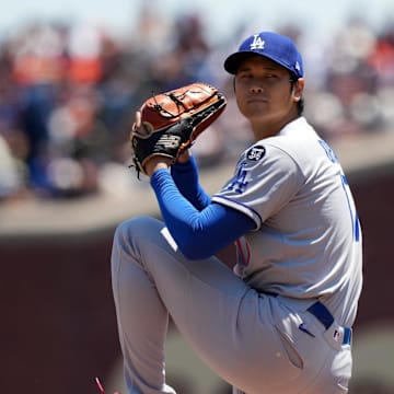 Los Angeles Dodgers starting pitcher Shohei Ohtani (17) throws a pitch against the San Francisco Giants during the first inning at Oracle Park on July 12. 