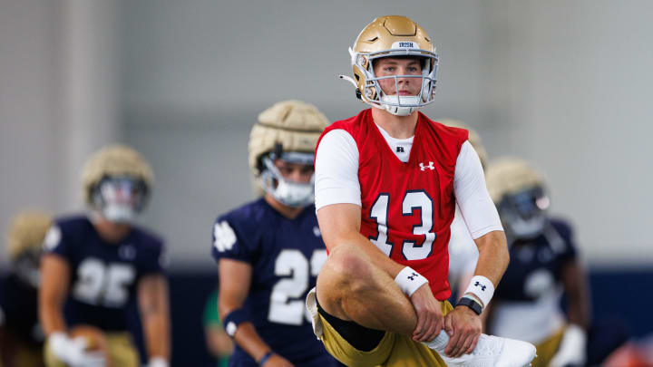 Notre Dame quarterback Riley Leonard warms up during a Notre Dame football practice at Irish Athletic Center on Wednesday, July 31, 2024, in South Bend.