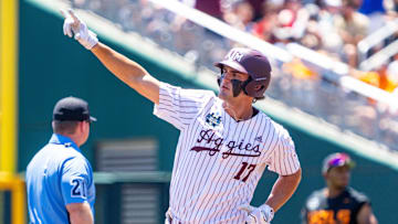 Jun 23, 2024; Omaha, NE, USA; Texas A&M Aggies right fielder Jace Laviolette (17) celebrates after hitting a home run against the Tennessee Volunteers during the first inning at Charles Schwab Field Omaha. Mandatory Credit: Dylan Widger-Imagn Images
