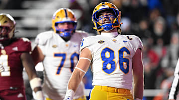 Nov 30, 2024; Chestnut Hill, Massachusetts, USA; Pittsburgh Panthers tight end Gavin Bartholomew (86) celebrates with his teammates after scoring a touchdown against the Boston College Eagles during the second half at Alumni Stadium. Mandatory Credit: Brian Fluharty-Imagn Images