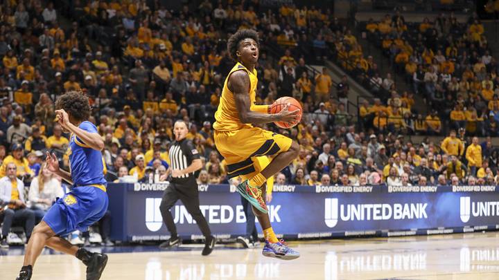 Nov 13, 2025; Morgantown, West Virginia, USA; West Virginia Mountaineers guard Honor Huff (3) makes a move in the lane and shoots during the second half against the Pittsburgh Panthers at WVU Coliseum. Mandatory Credit: Ben Queen-Imagn Images