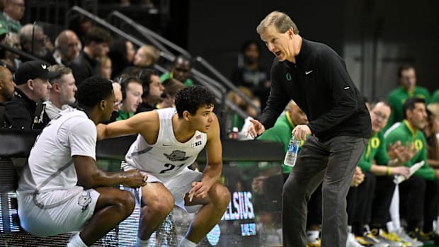 Feb 2, 2025; Eugene, Oregon, USA; Oregon Ducks head coach Dana Altman gives player instructions during the first half against