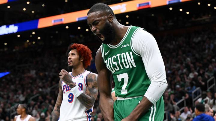 Apr 21, 2026; Boston, Massachusetts, USA; Boston Celtics guard Jaylen Brown (7) reacts after being folded by Philadelphia 76ers guard Kelly Oubre Jr. (9) in the second half of a game two of the first round of the 2026 NBA Playoffs at TD Garden. Mandatory Credit: Brian Fluharty-Imagn Images