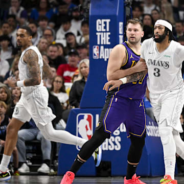 Apr 9, 2025; Dallas, Texas, USA; Los Angeles Lakers guard Luka Doncic (77) and forward LeBron James (23) and Dallas Mavericks forward Anthony Davis (3) in action during the game between the Dallas Mavericks and the Los Angeles Lakers at American Airlines Center. Mandatory Credit: Jerome Miron-Imagn Images