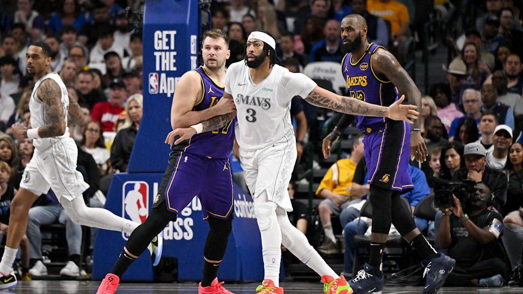 Apr 9, 2025; Dallas, Texas, USA; Los Angeles Lakers guard Luka Doncic (77) and forward LeBron James (23) and Dallas Mavericks forward Anthony Davis (3) in action during the game between the Dallas Mavericks and the Los Angeles Lakers at American Airlines Center. Mandatory Credit: Jerome Miron-Imagn Images