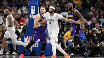 Apr 9, 2025; Dallas, Texas, USA; Los Angeles Lakers guard Luka Doncic (77) and forward LeBron James (23) and Dallas Mavericks forward Anthony Davis (3) in action during the game between the Dallas Mavericks and the Los Angeles Lakers at American Airlines Center. Mandatory Credit: Jerome Miron-Imagn Images