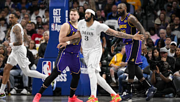 Apr 9, 2025; Dallas, Texas, USA; Los Angeles Lakers guard Luka Doncic (77) and forward LeBron James (23) and Dallas Mavericks forward Anthony Davis (3) in action during the game between the Dallas Mavericks and the Los Angeles Lakers at American Airlines Center. Mandatory Credit: Jerome Miron-Imagn Images