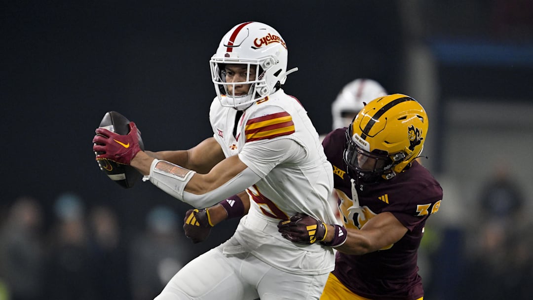 Dec 7, 2024; Arlington, TX, USA; Iowa State Cyclones wide receiver Jayden Higgins (9) and Arizona State Sun Devils defensive back Kyan McDonald (38) in action during the game between the Iowa State Cyclones and the Arizona State Sun Devils at AT&T Stadium. Mandatory Credit: Jerome Miron-Imagn Images