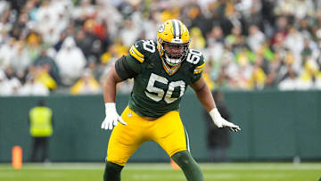 Oct 13, 2024; Green Bay, Wisconsin, USA;  Green Bay Packers offensive linenam Zach Tom (50) during the game against the Arizona Cardinals at Lambeau Field. Mandatory Credit: Jeff Hanisch-Imagn Images