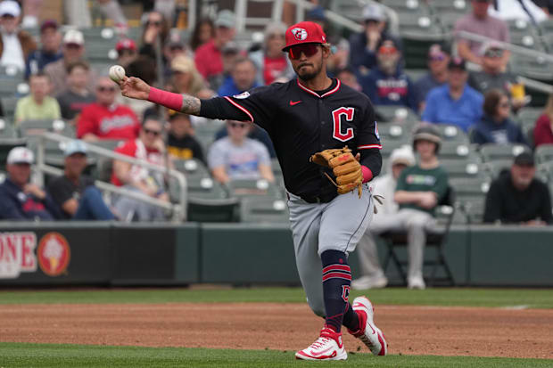 Guardians third base Gabriel Arias (13) makes the play for an out
