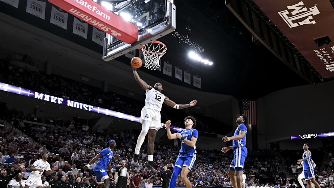 Mar 3, 2026; College Station, Texas, USA; Texas A&M Aggies forward Rashaun Agee (12) makes a lay up against the Kentucky Wildcats during the second half at Reed Arena. Mandatory Credit: Maria Lysaker-Imagn Images 
