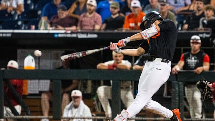 Jun 13, 2025; Omaha, Neb, USA; Oregon State Beavers left fielder Gavin Turley (1) hits a walk off RBI double against the Louisville Cardinals during the ninth inning at Charles Schwab Field. Mandatory Credit: Dylan Widger-Imagn Images Jun 13, 2025; Omaha, Neb, USA; Oregon State Beavers left fielder Gavin Turley (1) hits a walk off RBI double against the Louisville Cardinals during the ninth inning at Charles Schwab Field. Mandatory Credit: Dylan Widger-Imagn Images