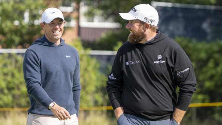 July 17, 2023; Hoylake, ENGLAND, GBR; Rory McIlroy (left) and Shane Lowry (right) smile on the