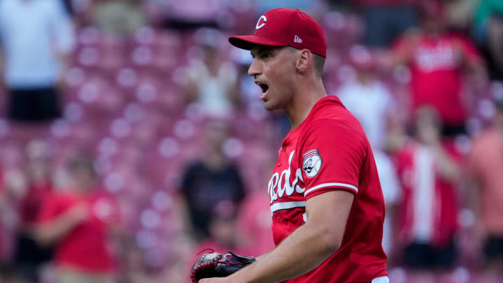 Cincinnati Reds relief pitcher Brent Suter (31) cheers to his teammates after the final out of the ninth inning of the MLB National League game between the Cincinnati Reds and the Miami Marlins at Great American Ball Park in downtown Cincinnati on Saturday, July 13, 2024. The Reds led 1-0 after two innings. The Reds won 10-6.