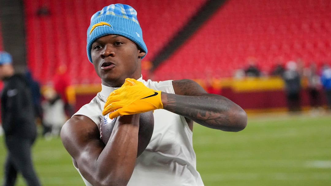 Dec 8, 2024; Kansas City, Missouri, USA; Los Angeles Chargers wide receiver DJ Chark Jr. (9) warms up against the Kansas City Chiefs prior to a game at GEHA Field at Arrowhead Stadium. Mandatory Credit: Denny Medley-Imagn Images