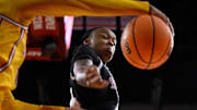 Mississippi State Bulldogs guard Eniya Russell (4) and USC Trojans guard Kennedy Smith (11) reach for a loose ball during the third quarter of an NCAA Tournament second round game at Galen Center.