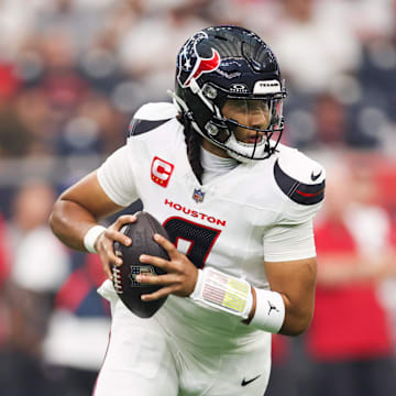 Sep 15, 2025; Houston, Texas, USA;  Houston Texans quarterback C.J. Stroud (7) drops back to pass during the first quarter against the Tampa Bay Buccaneers at NRG Stadium. Mandatory Credit: Troy Taormina-Imagn Images