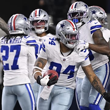 Dallas Cowboys defensive end Marshawn Kneeland celebrates after recovering a blocked punt for a TD against the Arizona Cardinals