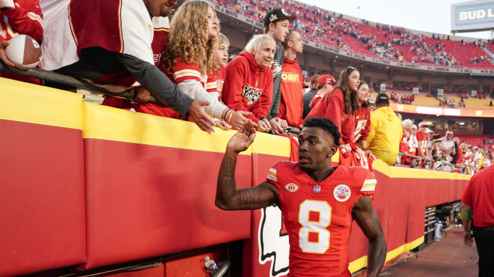 Oct 12, 2023; Kansas City, Missouri, USA; Kansas City Chiefs wide receiver Justyn Ross (8) celebrates with fans while leaving the game after the win over the Los Angeles Chargers at GEHA Field at Arrowhead Stadium. Mandatory Credit: Denny Medley-USA TODAY Sports