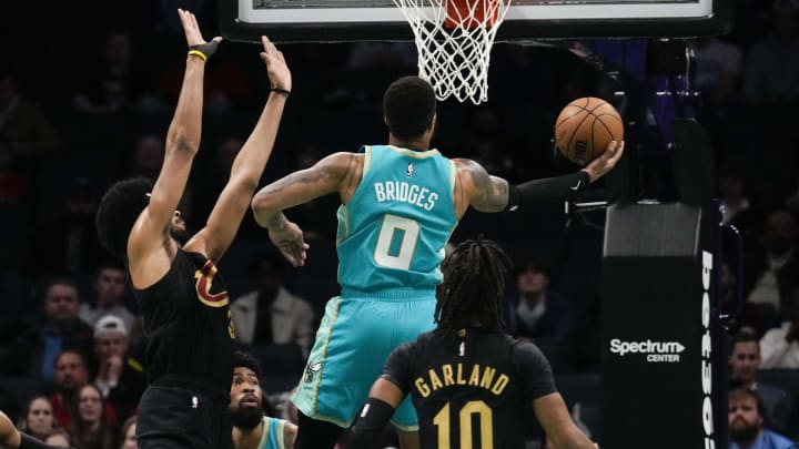 Mar 27, 2024; Charlotte, North Carolina, USA; Charlotte Hornets forward Miles Bridges (0) goes up for a shot against the Cleveland Cavaliers during the first quarter at Spectrum Center. Mandatory Credit: Jim Dedmon-USA TODAY Sports