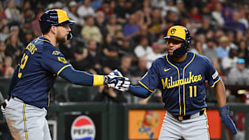 Jackson Chourio and Rhys Hoskins celebrate a Milwaukee Brewers victory in 2025.