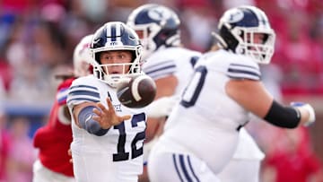 QB Jake Retzlaff pitches the ball to his running back against SMU.