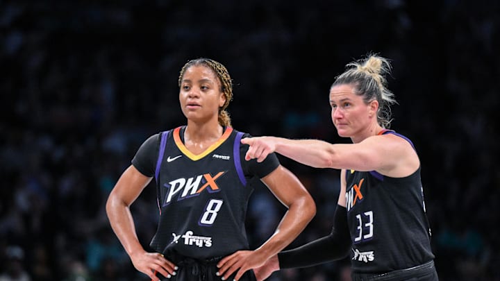 Jun 19, 2025; Brooklyn, New York, USA; Phoenix Mercury guard Monique Akoa Makani (8) and guard Sami Whitcomb (33) interact during the second half at Barclays Center. Mandatory Credit: John Jones-Imagn Images