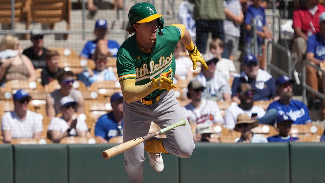 Mar 21, 2026; Phoenix, Arizona, USA; Athletics right fielder Henry Bolte (33) hits against the Los Angeles Dodgers in the second inning at Camelback Ranch-Glendale. Mandatory Credit: Rick Scuteri-Imagn Images